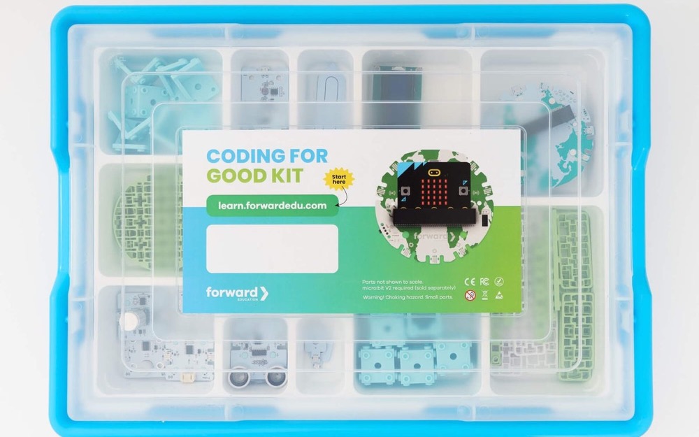 The Forward Education Coding for Good Kit in its blue storage case, parts sorted into trays